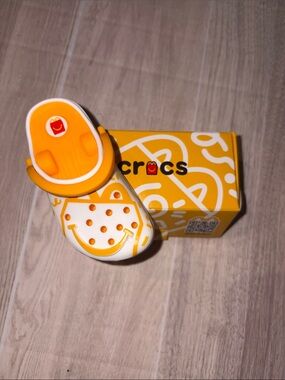 CROCS Collectible White and Orange Smiley